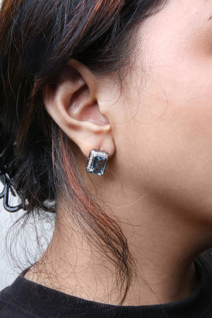 18K White Gold 3/4 Cttw Round Diamond and 13x9mm Emerald Cut Blue Aquamarine Gemstone Halo Omega Stud Earrings (G - H Color, SI1 - SI2 Clarity) - Rieworkes