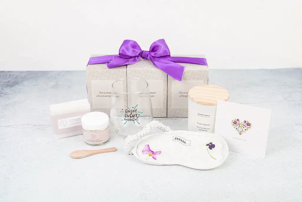 Lizush Luxury Spa Gift Basket And Self Care Gifts For Women With Wine Glass, Candle, Lavender Soap Bar, Facial Clay Mask, Eye Mask - Enjoy Every Moment - 5 Piece Set Rieworkes