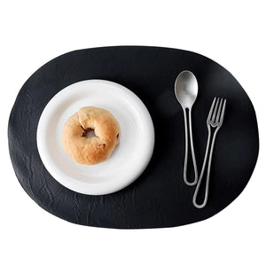 Welan PU Leather Oval Placemats Set of 4 Washable Easy Clean Heat Resistant for Dining Table Kitchen Decor (Black) Mimarta